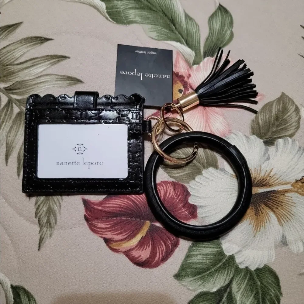 #078 Nanette Lepore Alli CC case w ring bracelet & black tassel